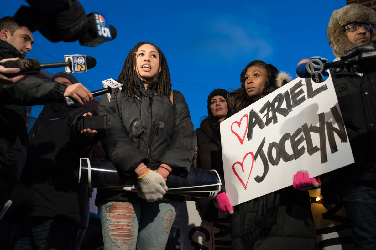 Demonstrators gather near R&B singer R. Kelly's former recording studio in Chicago on January 9, 2019, following the release of a Lifetime docuseries "Surviving R. Kelly," which highlighted years of sexual abuse against young Black women.