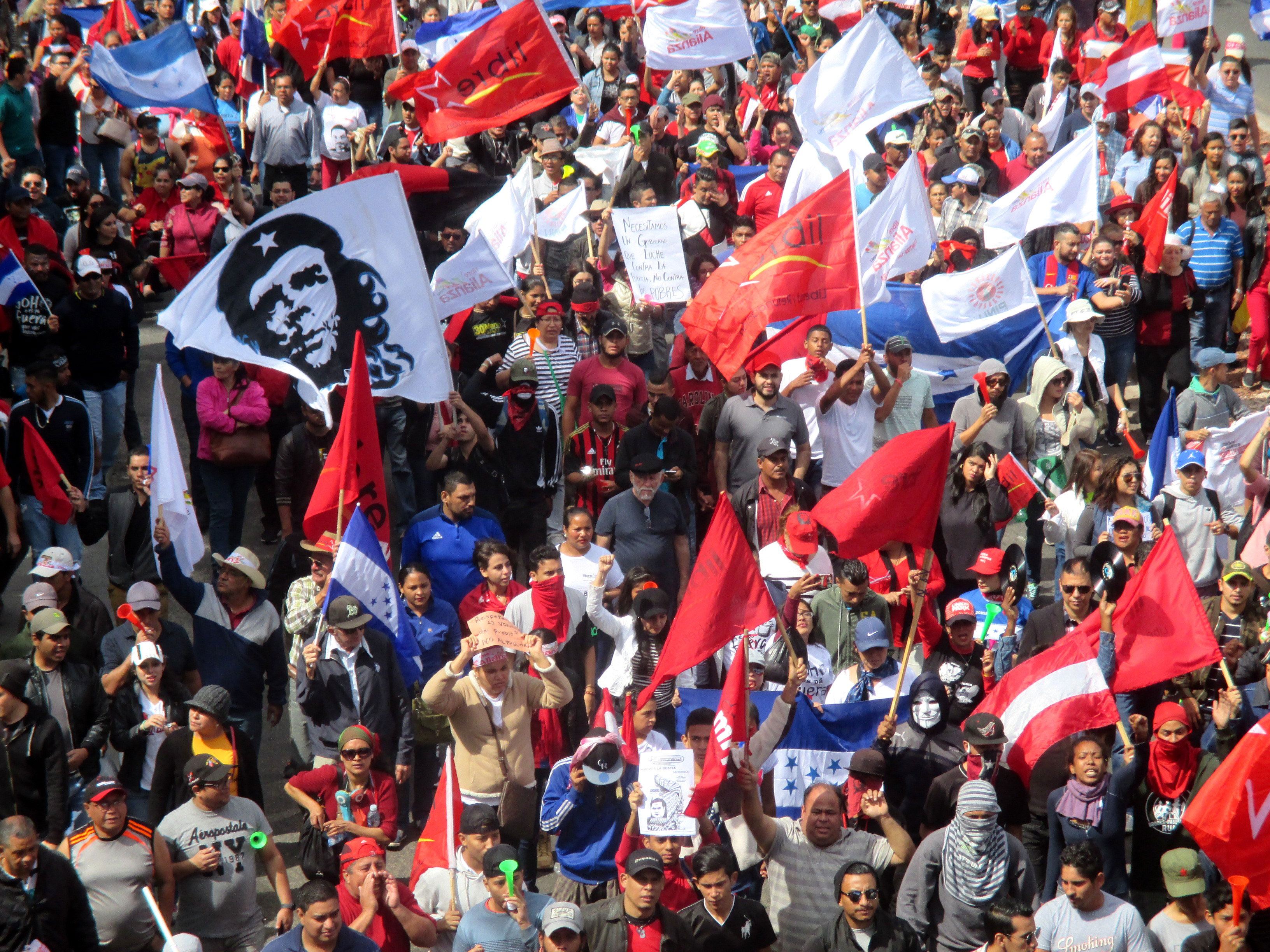 Thousands march through the Honduran capital in December 2017 to protest election fraud.