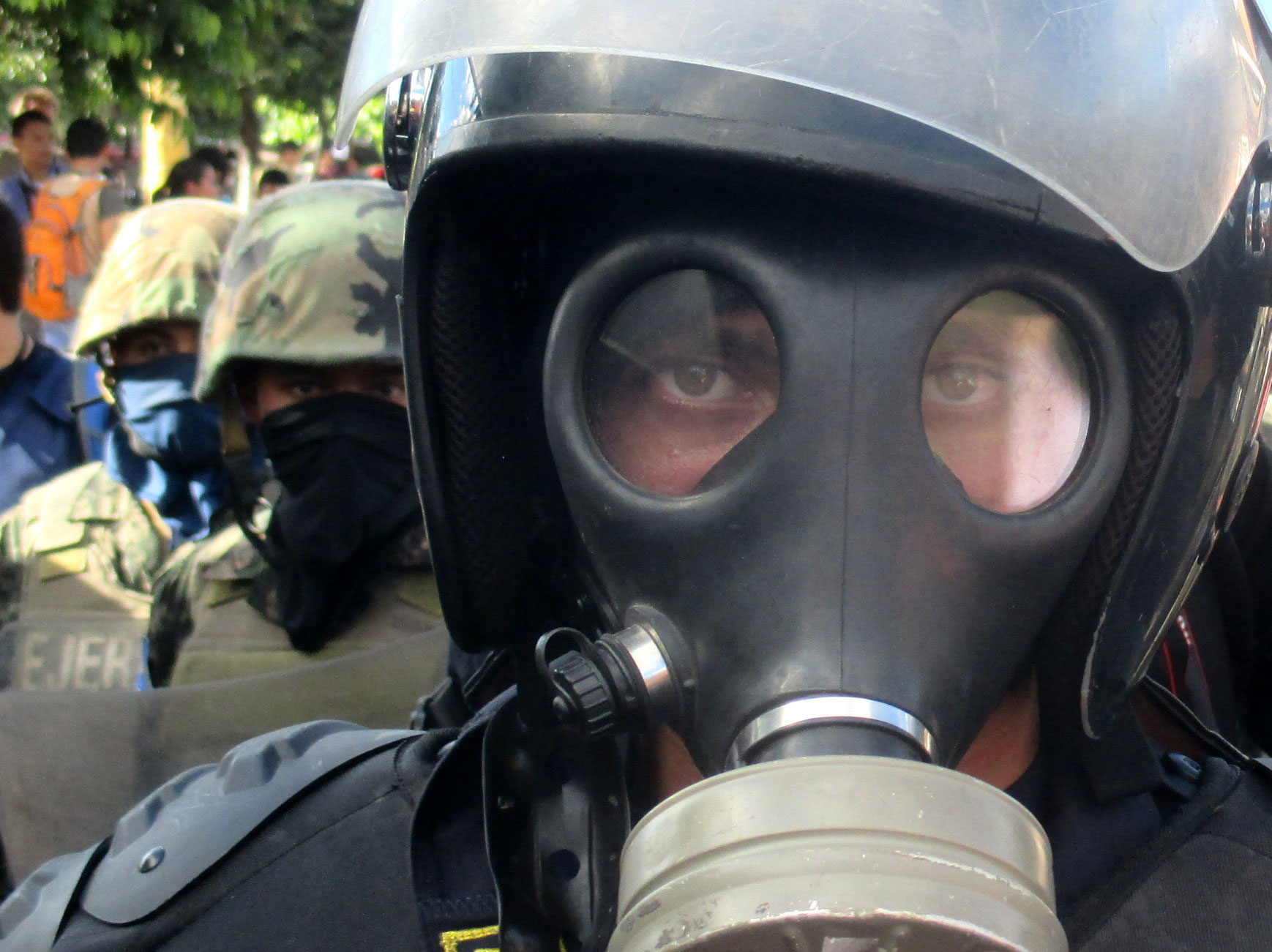 Police and soldiers face off against protesters during a December 2017 march in Tegucigalpa, Honduras.