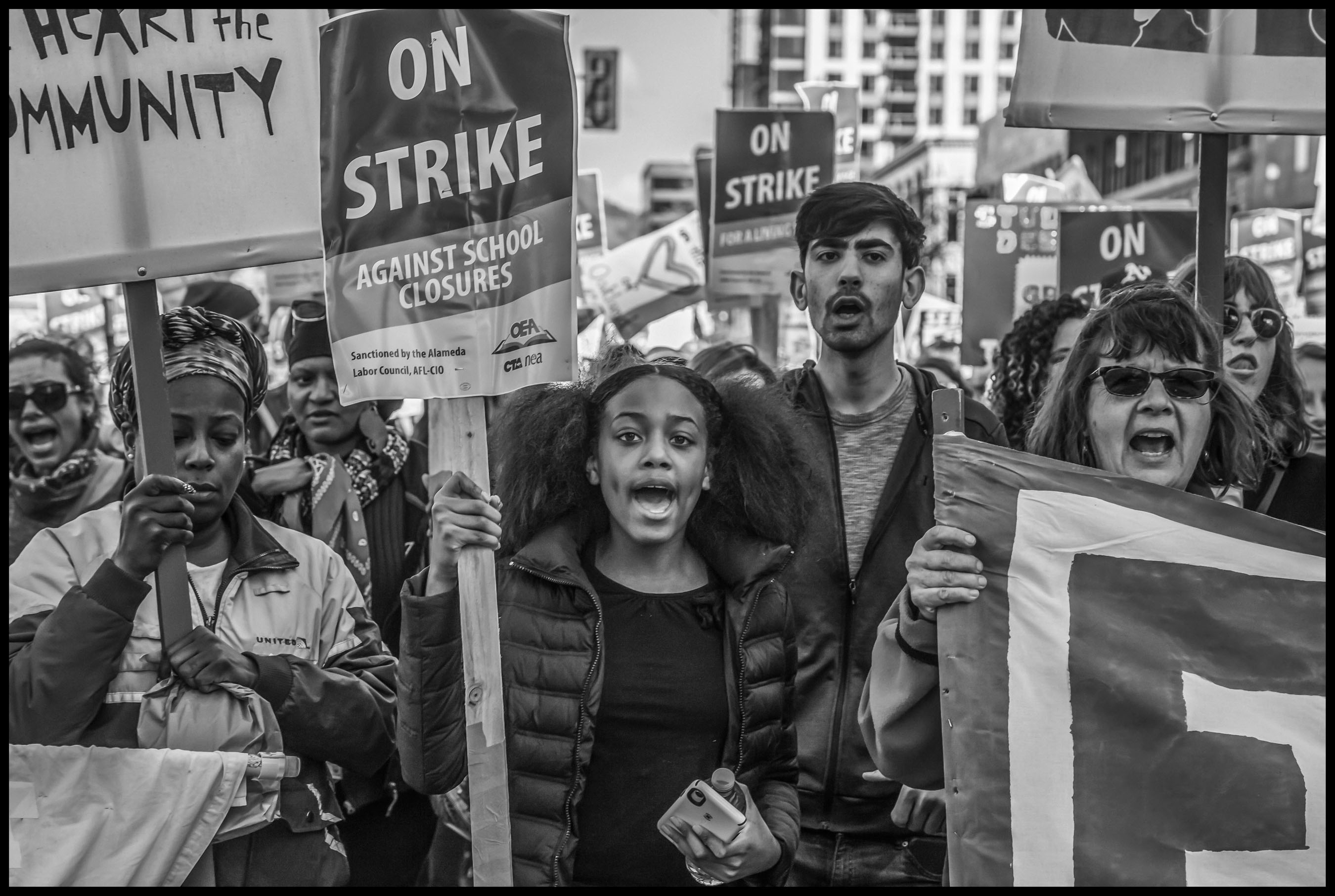 Students, parents and teachers demonstrate support for the strike.