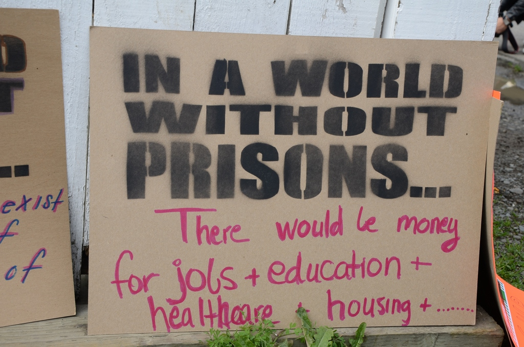 A protest sign leans against a wall during the Occupy4Prisoners Rally at San Quentin Prison in Marin County, California, on February 20, 2012.