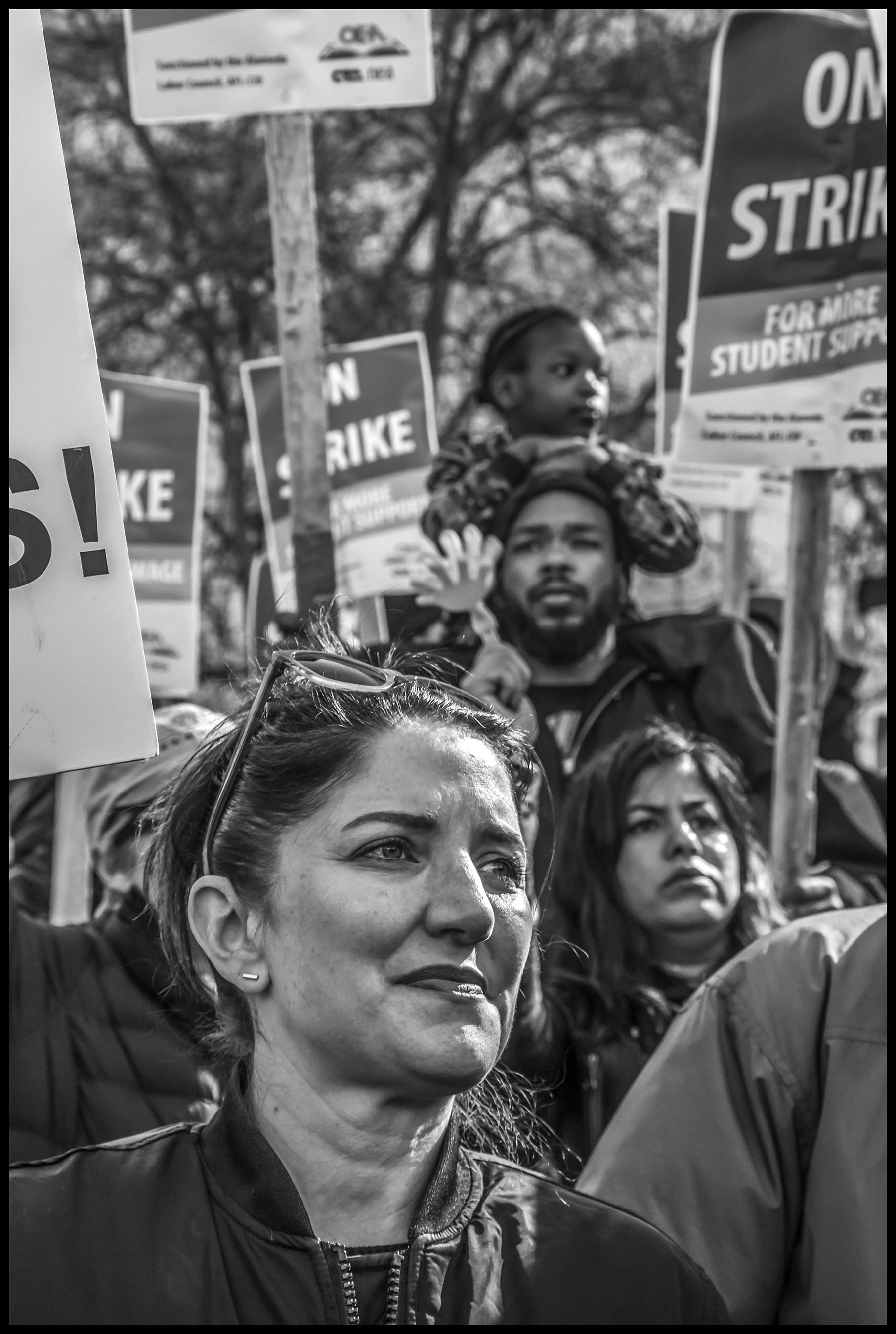 Teachers and community activists in a rally before the march.