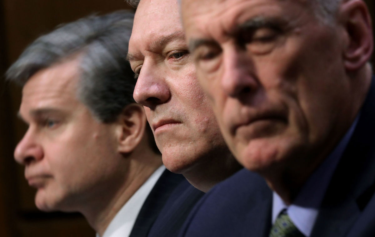 (L-R) FBI Director Christopher Wray, CIA Director Mike Pompeo, Director of National Intelligence Dan Coats and other intelligence community officials testify before the Senate Intelligence Committee in the Hart Senate Office Building on Capitol Hill, February 13, 2018, in Washington, DC.