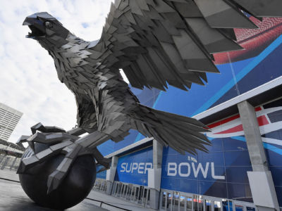 'The Falcon' is seen outside Mercedes-Benz Stadium in Atlanta, Georgia on February 2, 2019. The owners of both the Rams and Patriots have duked it out in the arena of political spending.