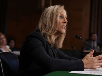 Consumer Financial Protection Bureau Director Kathy Kraninger testifies during a confirmation hearing before the Senate Committee on Banking, Housing, and Urban Affairs, July 19, 2018, on Capitol Hill in Washington, DC.