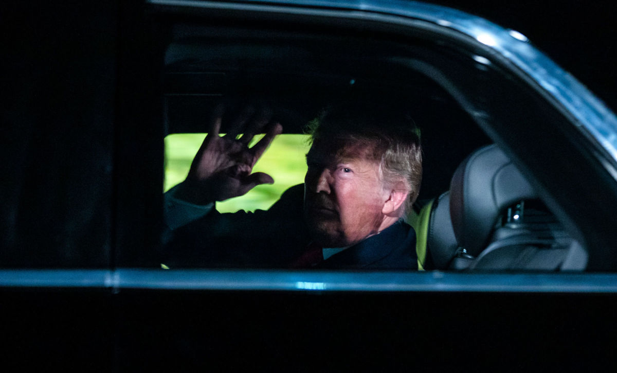 President Trump sits in the presidential limo as he departs the White House for Capitol Hill on February 5, 2019, in Washington, DC.