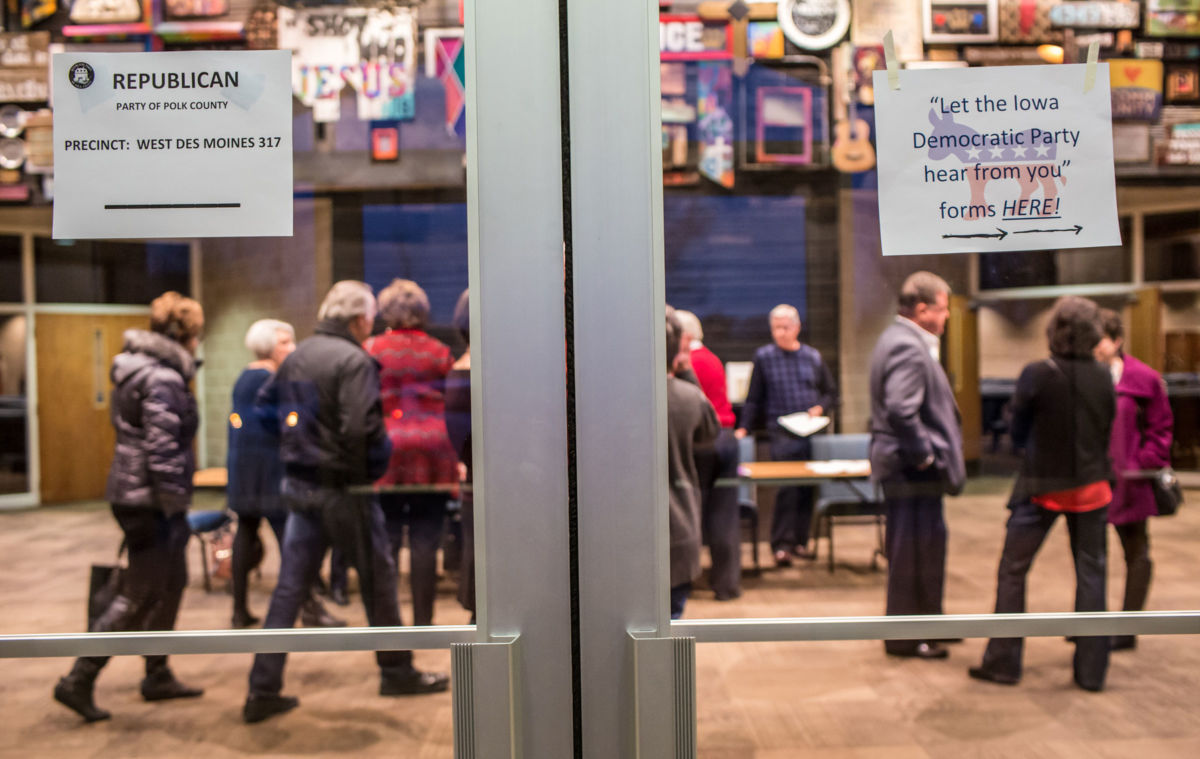 Signs direct Republican and Democratic caucus-goers at Valley Church in West Des Moines, Iowa, on February 1, 2016.