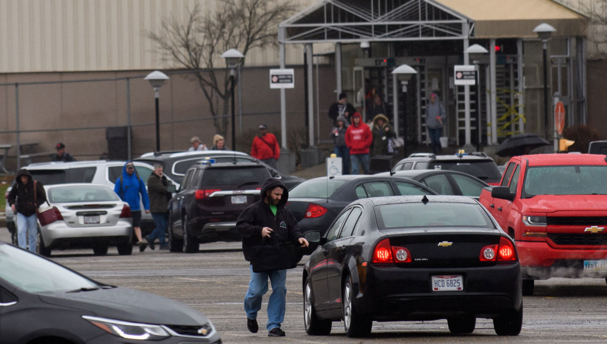 Employees leave the GM Lordstown Plant on November 26, 2018, in Lordstown, Ohio. GM said it would end production at five North American plants including Lordstown, and cut 15 percent of its salaried workforce.