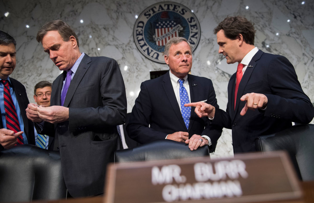 Chairman Richard Burr, center, arrives for a Senate Select Committee on Intelligence confirmation hearing in Hart Building on May 9, 2018.