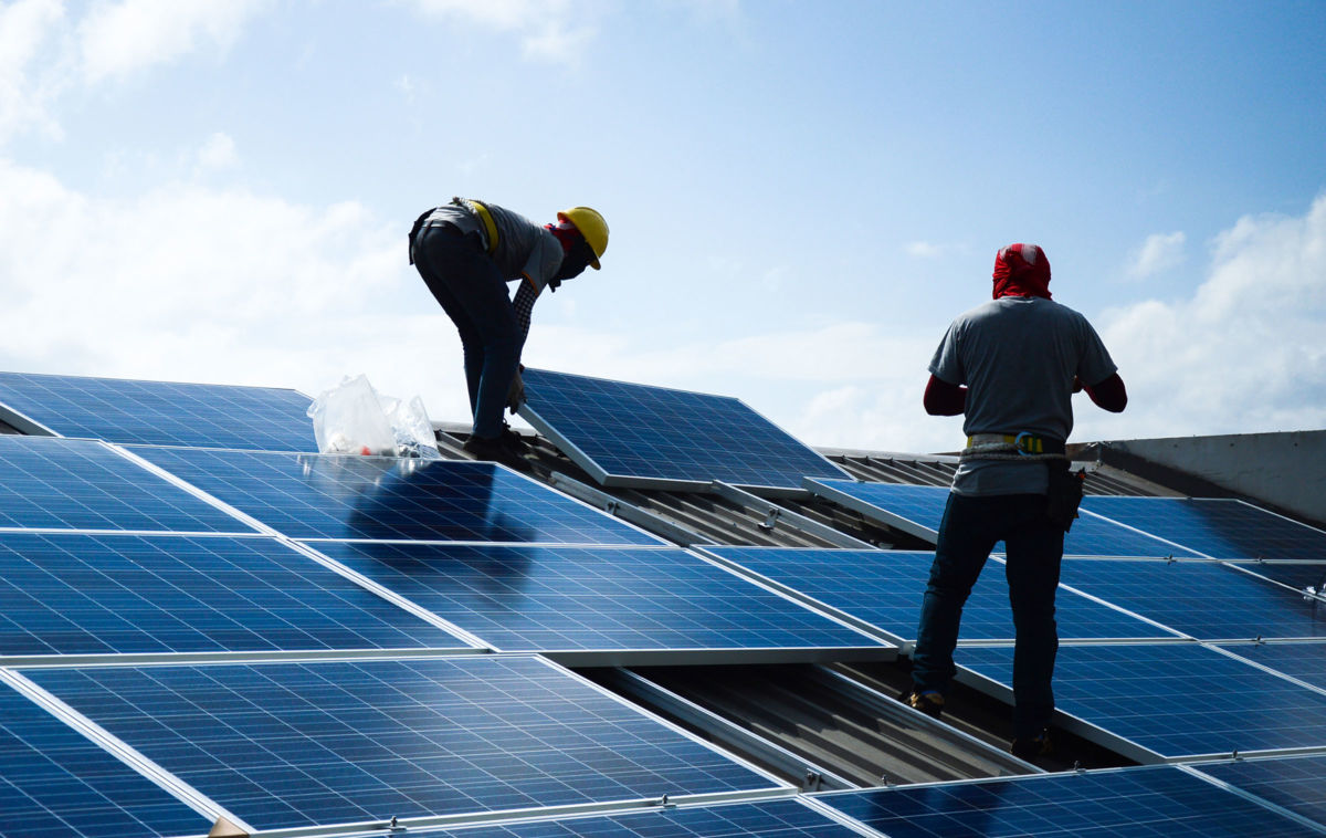 Solar energy installation provides good, union jobs for electrical workers.