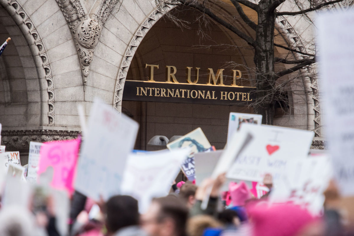 Trump International Hotel on Pennsylvania Avenue during the Women's March on January 21, 2017, in Washington, D.C. Ethics watchdogs are worried Trump is trying to enrich himself unconstitutionally under the foreign emoluments clause.