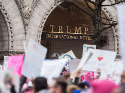 Trump International Hotel on Pennsylvania Avenue during the Women's March on January 21, 2017, in Washington, D.C. Ethics watchdogs are worried Trump is trying to enrich himself unconstitutionally under the foreign emoluments clause.