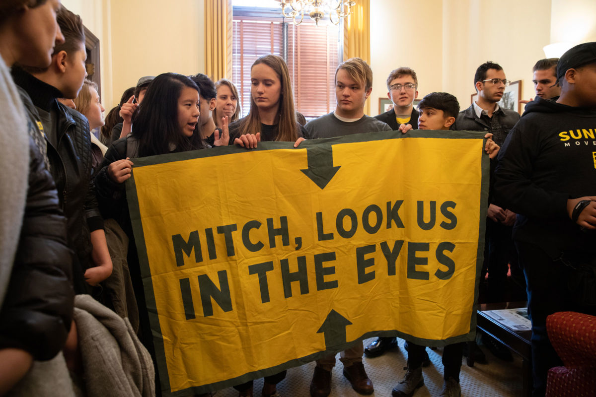 More than 40 youth climate activists who support the Green New Deal resolution were arrested for staging a sit-in at the Washington, D.C., office of Senate Majority Leader Mitch McConnell on February 25, 2019.