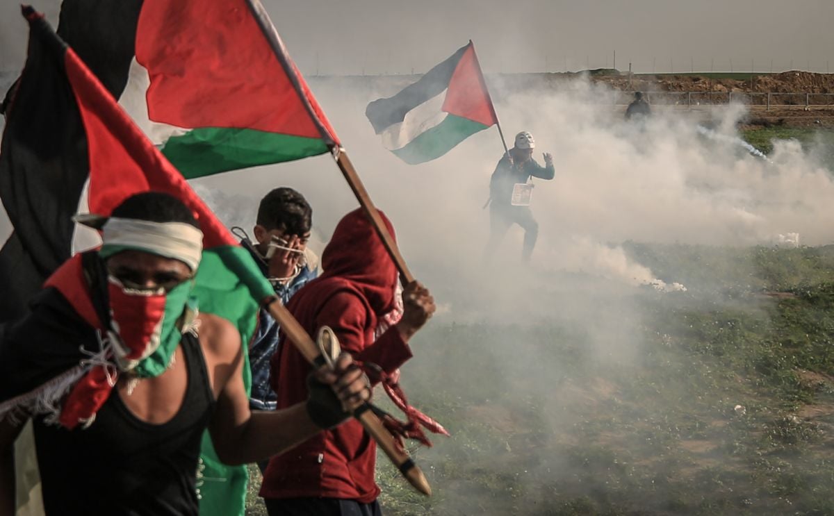 Israeli security forces use tear gas to disperse Palestinians protesting during the "Great March of Return" demonstration in the Shuja'iyya neighborhood of Gaza City, Gaza, on February 1, 2019.