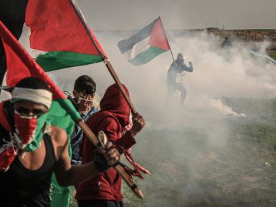 Israeli security forces use tear gas to disperse Palestinians protesting during the "Great March of Return" demonstration in the Shuja'iyya neighborhood of Gaza City, Gaza, on February 1, 2019.