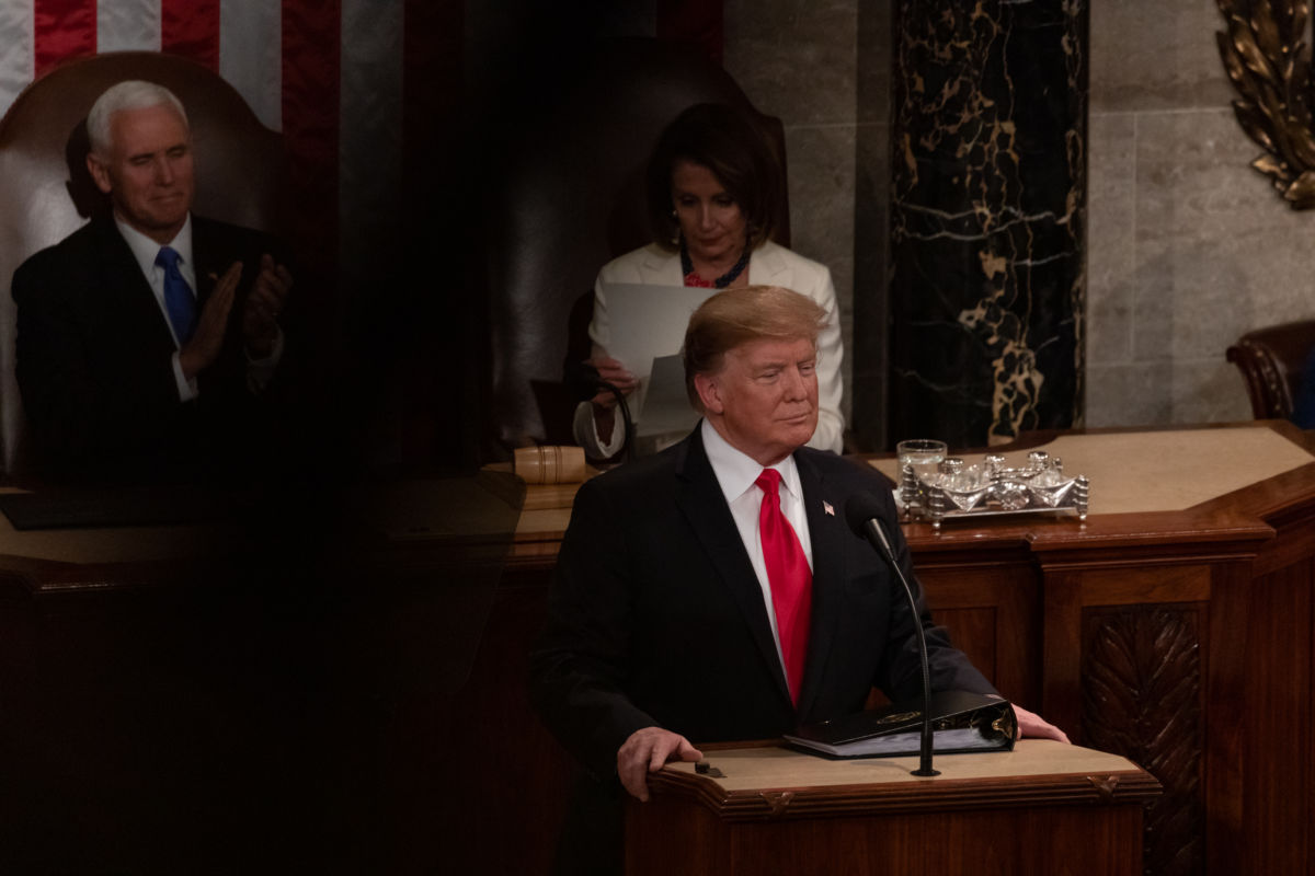 President Trump delivers his second State of the Union address as Vice President Mike Pence stands with applause at US Capitol in Washington, DC, on Tuesday, February 5, 2019.