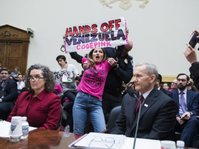 Code Pink protesters interrupt the testimony of Elliott Abrams, off camera, U.S. special representative for Venezuela, during a House Foreign Affairs Committee hearing in Rayburn Building titled "Venezuela at a Crossroads," on February 13, 2019.