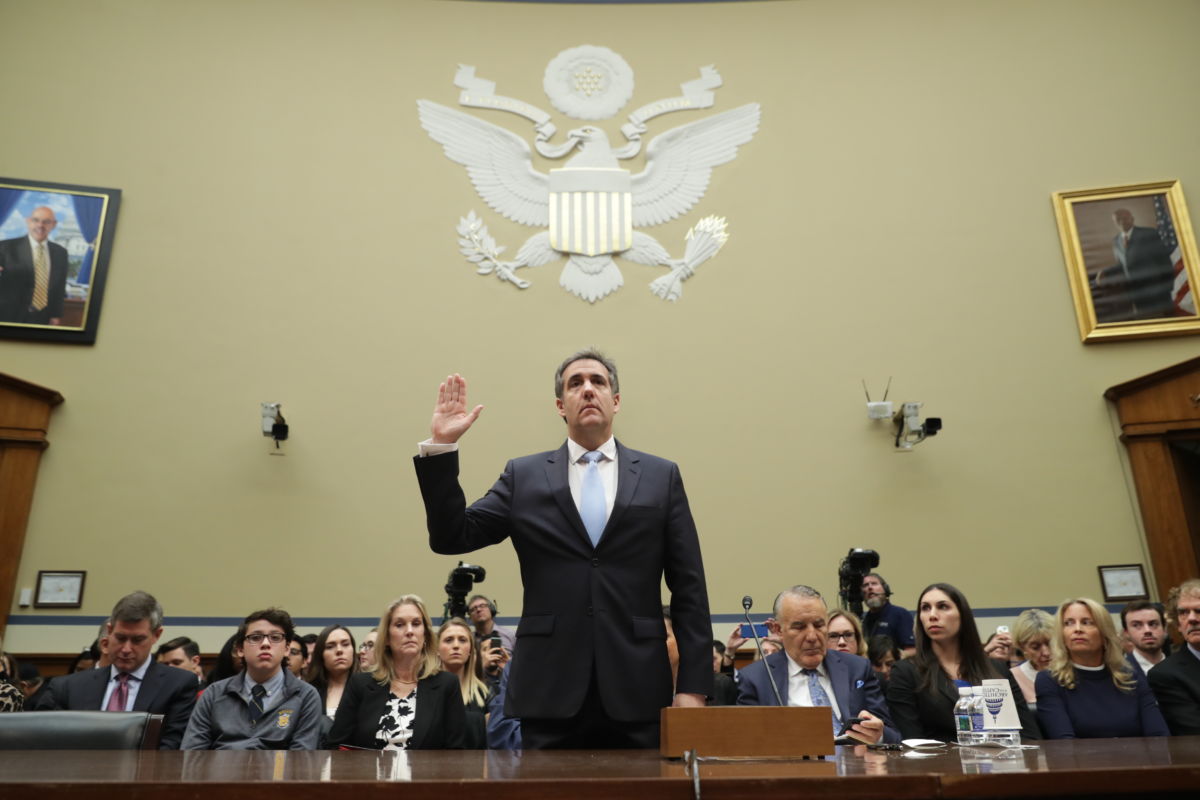 Michael Cohen, former attorney and fixer for Donald Trump, is sworn in before testifying in front of the House Oversight Committee on Capitol Hill, February 27, 2019, in Washington, D.C.