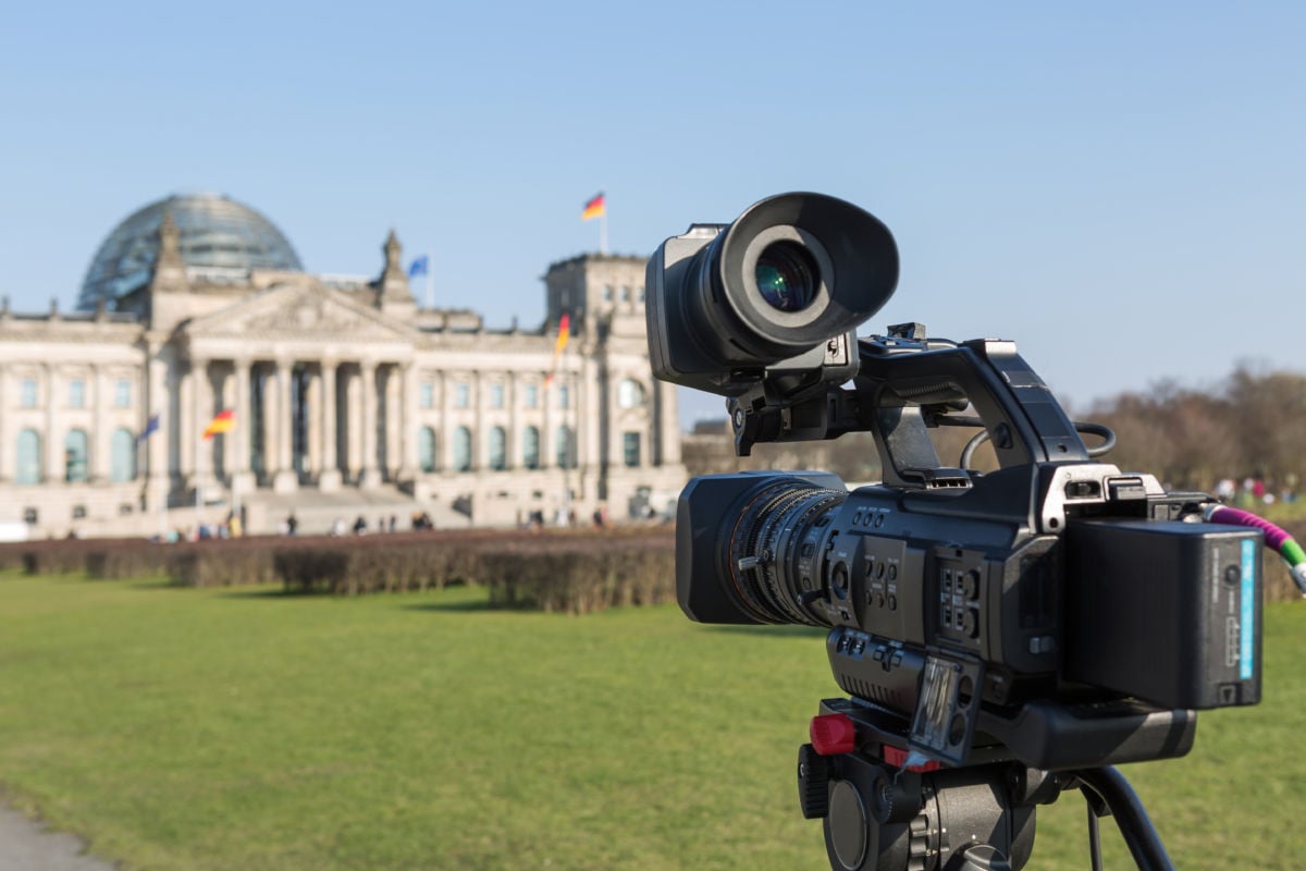 A video camera stands outside the Reichstag, the meeting place of the Germany Parliament. An infamous fire in February 1933 was used as a pretext by the Nazis for mass arrests of communists and increased police repression.