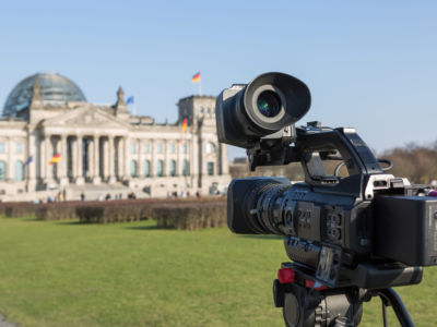 A video camera stands outside the Reichstag, the meeting place of the Germany Parliament. An infamous fire in February 1933 was used as a pretext by the Nazis for mass arrests of communists and increased police repression.