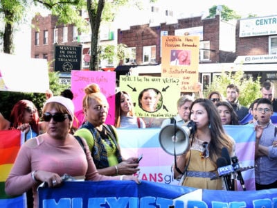 Bianey García (with megaphone) at a June 2018 rally for undocumented sex worker who was the target of an alleged hate attack in the Jackson Heights neighborhood of Queens.