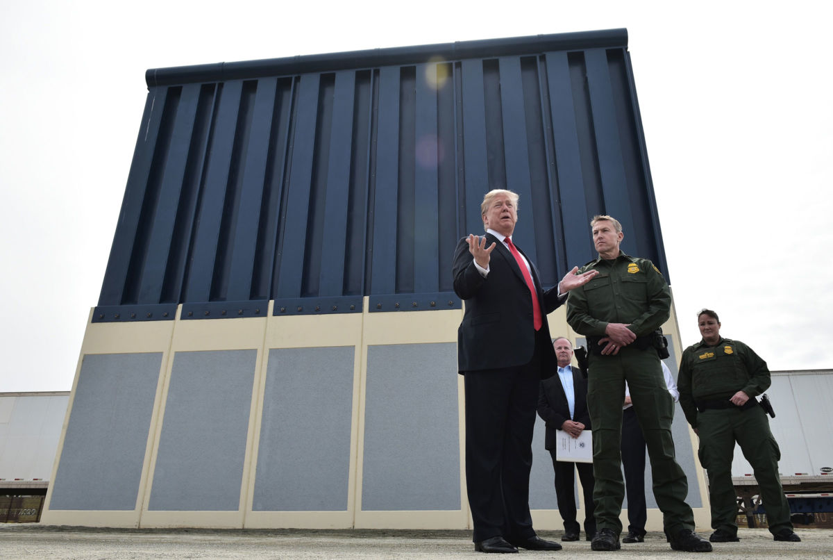 President Trump inspects border wall prototypes in San Diego, California, on March 13, 2018. For the right, Trump's wall is not just a literal wall, but a symbol of racial domination.