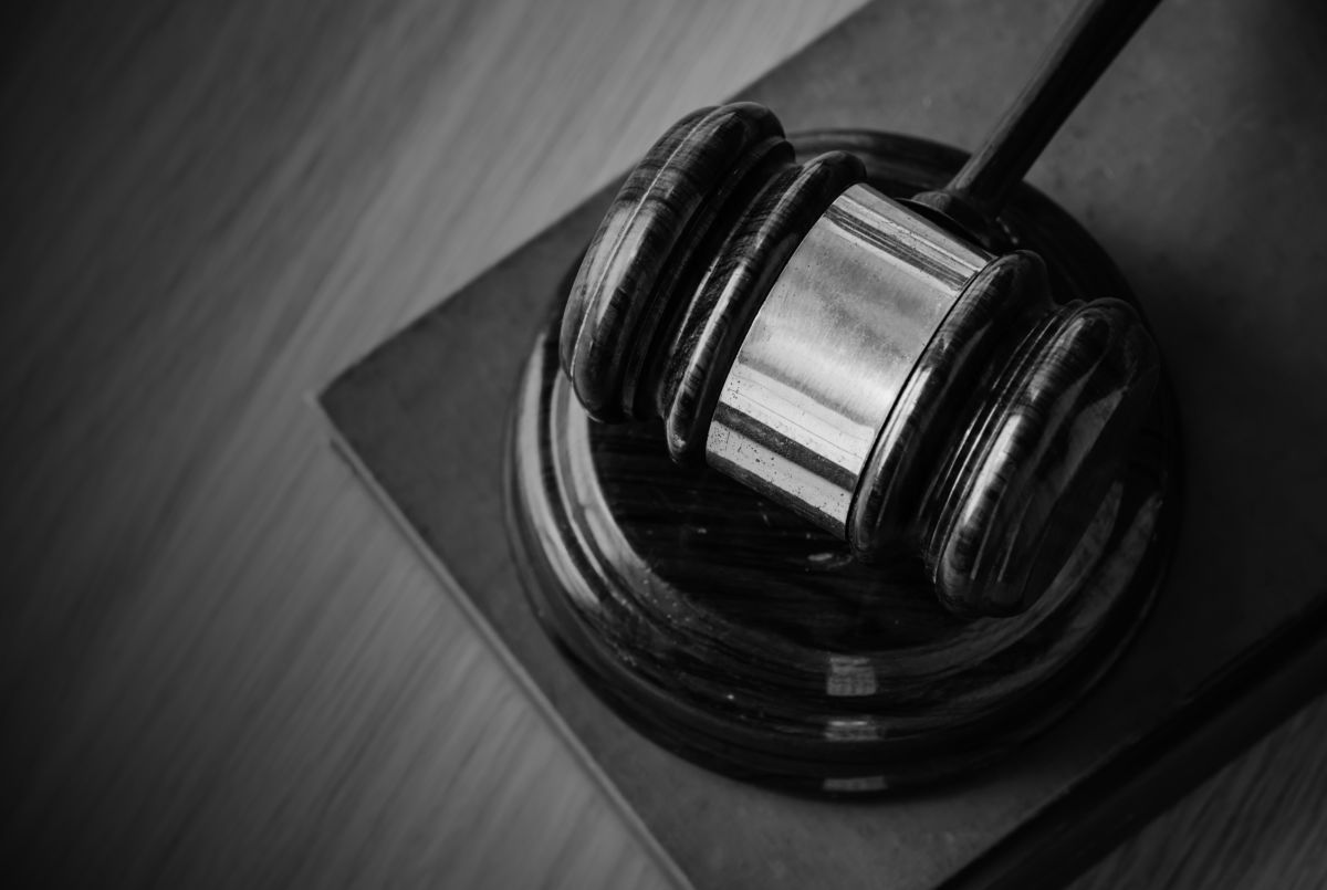 A black and white image of a gavel.