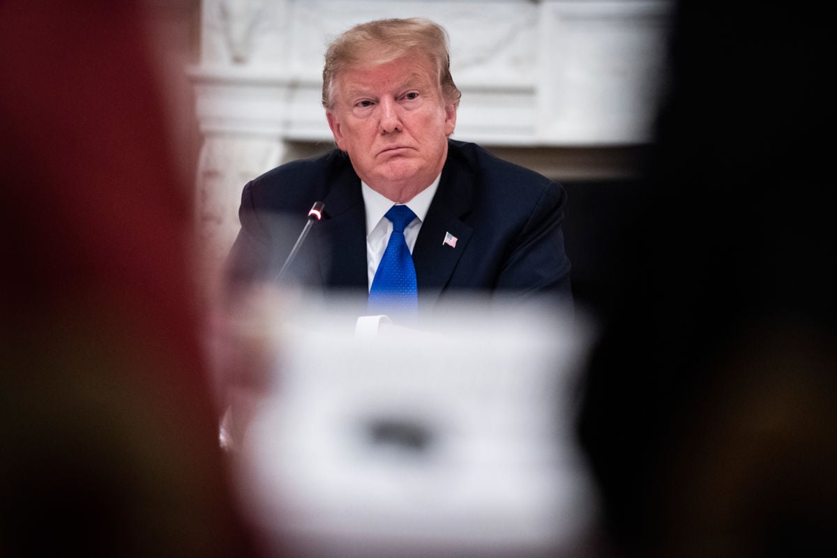 Donald Trump listens during a meeting in the white house