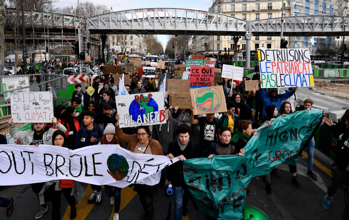 A student climate protest marches from Stalingrad to the Republic Square, March 8, 2019. A growing movement of young people are demanding that policymakers take urgent and radical steps on climate.