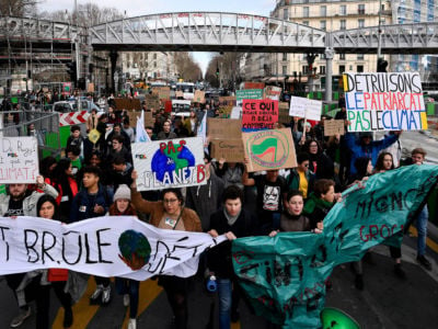 A student climate protest marches from Stalingrad to the Republic Square, March 8, 2019. A growing movement of young people are demanding that policymakers take urgent and radical steps on climate.