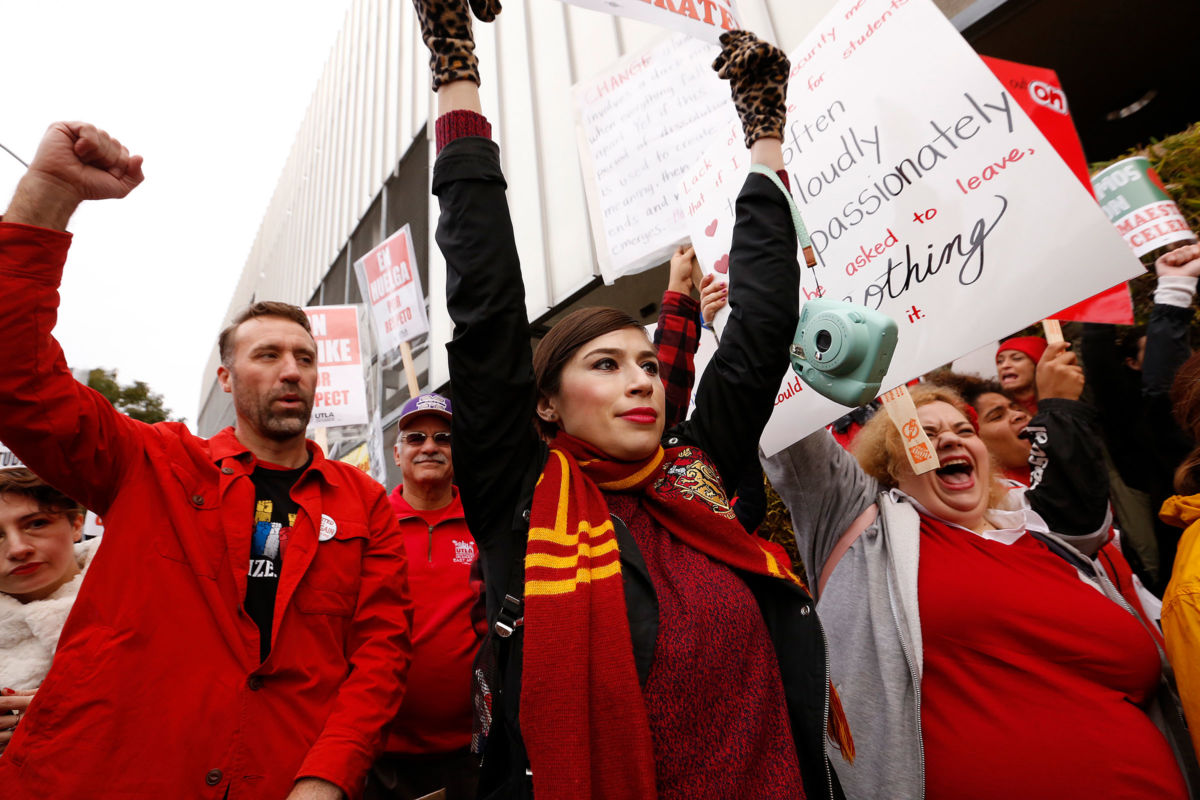 Teachers at The Accelerated Schools, a community of public charter schools in South Los Angeles picket outside the school on second day of the Los Angeles school teachers strike on January 15, 2019, in Los Angeles, California.