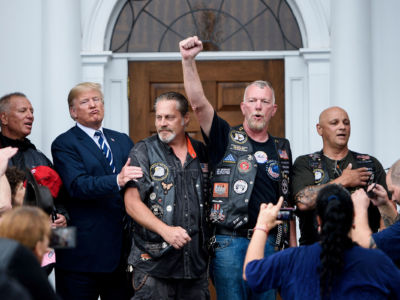 President Donald Trump stands with Bikers for Trump at Trump National Golf Club.