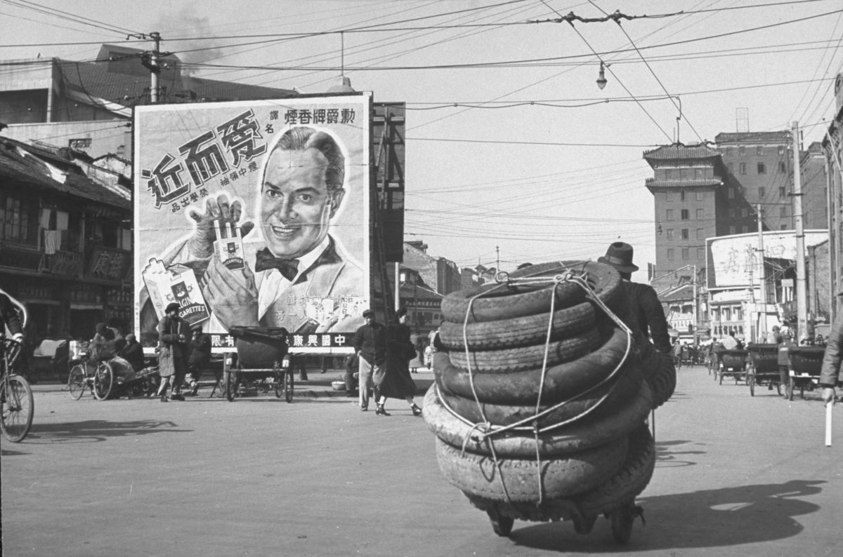 A billboard advertising fancy cigarettes in Shanghai, 1948.