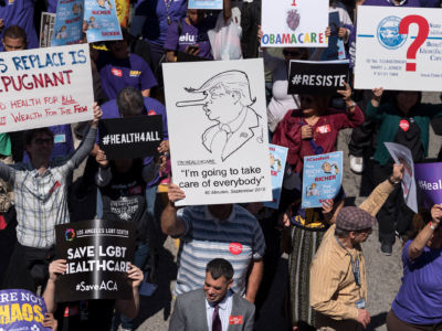 Affordable Care Act supporters participate in a rally in Los Angeles, California