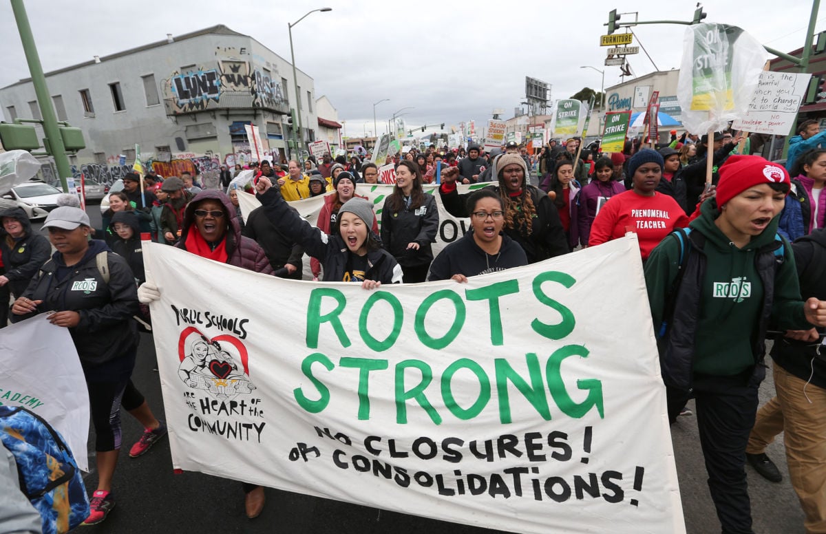 Striking teachers, students and supporters march towards rally in Oakland, California.