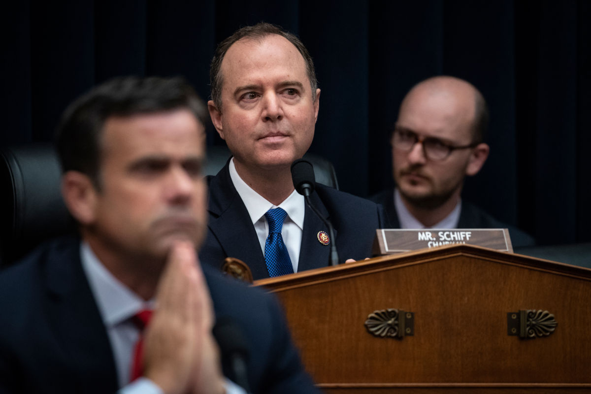 Rep. Adam Schiff sits at a desk