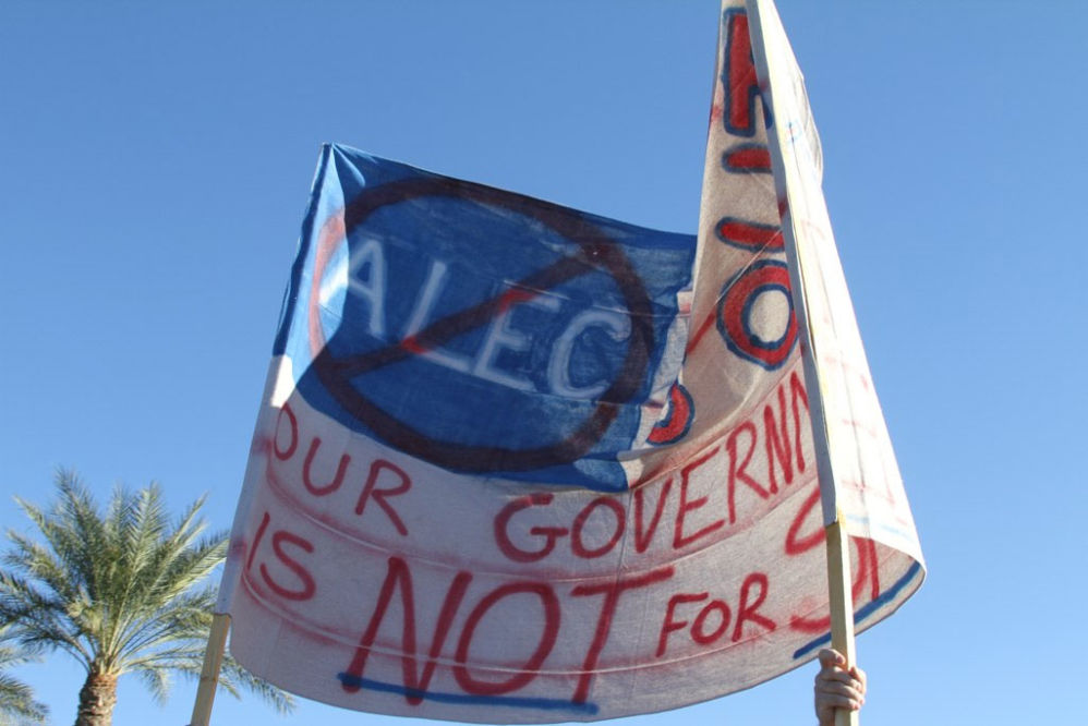 An anti-ALEC banner at a protest.