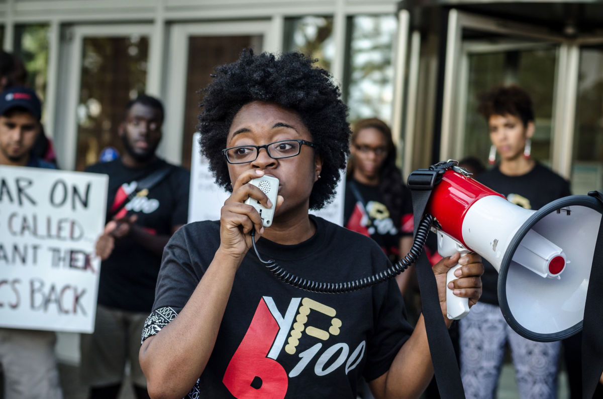 BYP100 activists participate in a march to and action at the CPD headquarters on August 26, 2014.