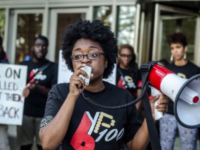 BYP100 activists participate in a march to and action at the CPD headquarters on August 26, 2014.
