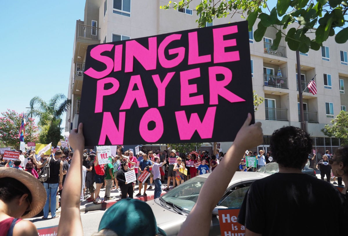 People rally in favor of single-payer healthcare in South Gate, California.