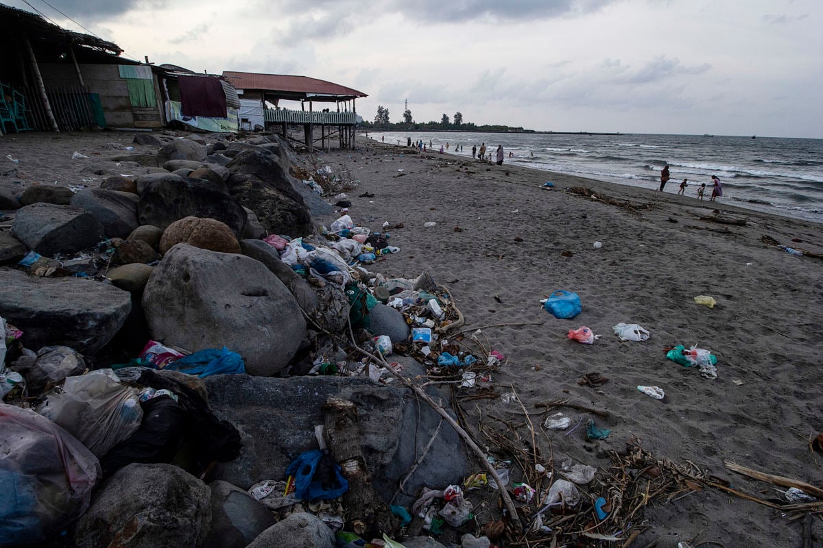 A view of the coastal area polluted by garbage in Ujong Blang village, Lhokseumawe, Indonesia. The country produces about 10.4 million tons of plastic waste per year. 8.2 million tons or 79 percent of plastic waste ends up in landfills and public places such as beaches.