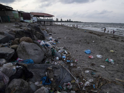 A view of the coastal area polluted by garbage in Ujong Blang village, Lhokseumawe, Indonesia. The country produces about 10.4 million tons of plastic waste per year. 8.2 million tons or 79 percent of plastic waste ends up in landfills and public places such as beaches.