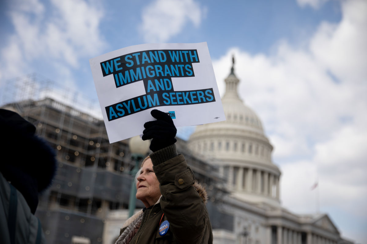 A group of immigrants and activists protest outside Capitol Hill against the Trump administration's immigration policy in Washington, D.C, on March 6, 2019.