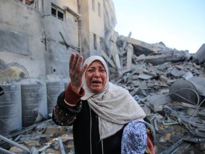 Maryam El Shawa weeps after Israeli warplanes carried out airstrike on an apartment building in Rimal neighborhood of Gaza City, Gaza, on March 26, 2019.