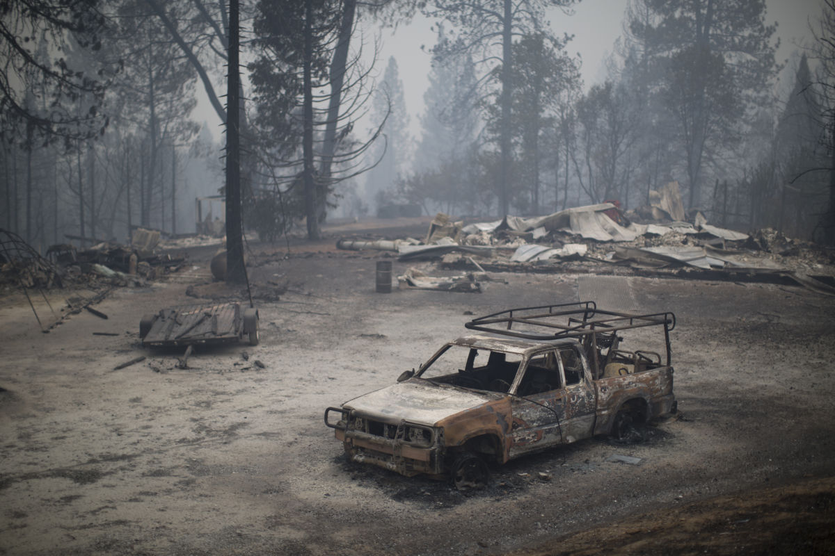 A burned truck and structures are seen in the wake of the Butte Fire, which burned over 70,000 acres, on September 13, 2015, near San Andreas, California.