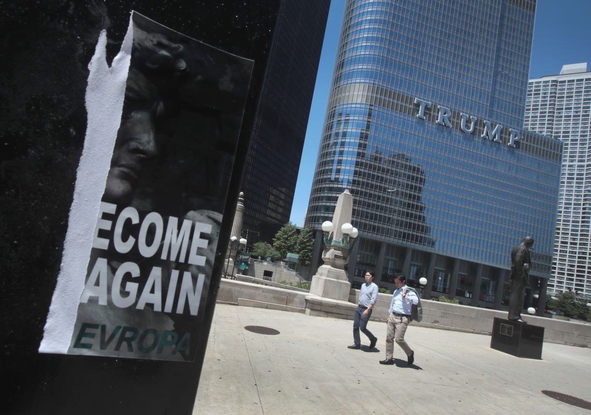 A defaced recruiting flyer for Identity Evropa hangs near Trump Tower on July 6, 2016 in Chicago, Illinois. The flyer which read "Let's Become Great Again" was part of a 17-city recruitment effort by the white nationalist organization.