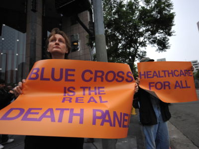 Protesters demonstrate outside the offices of health insurance company Blue Cross of California, in downtown Los Angeles on October 15, 2009.