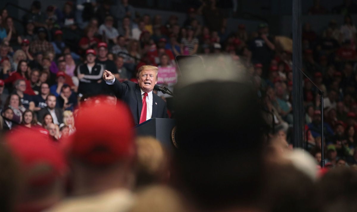 President Donald Trump speaks to supporters during a rally at the Van Andel Arena