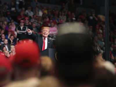 President Donald Trump speaks to supporters during a rally at the Van Andel Arena