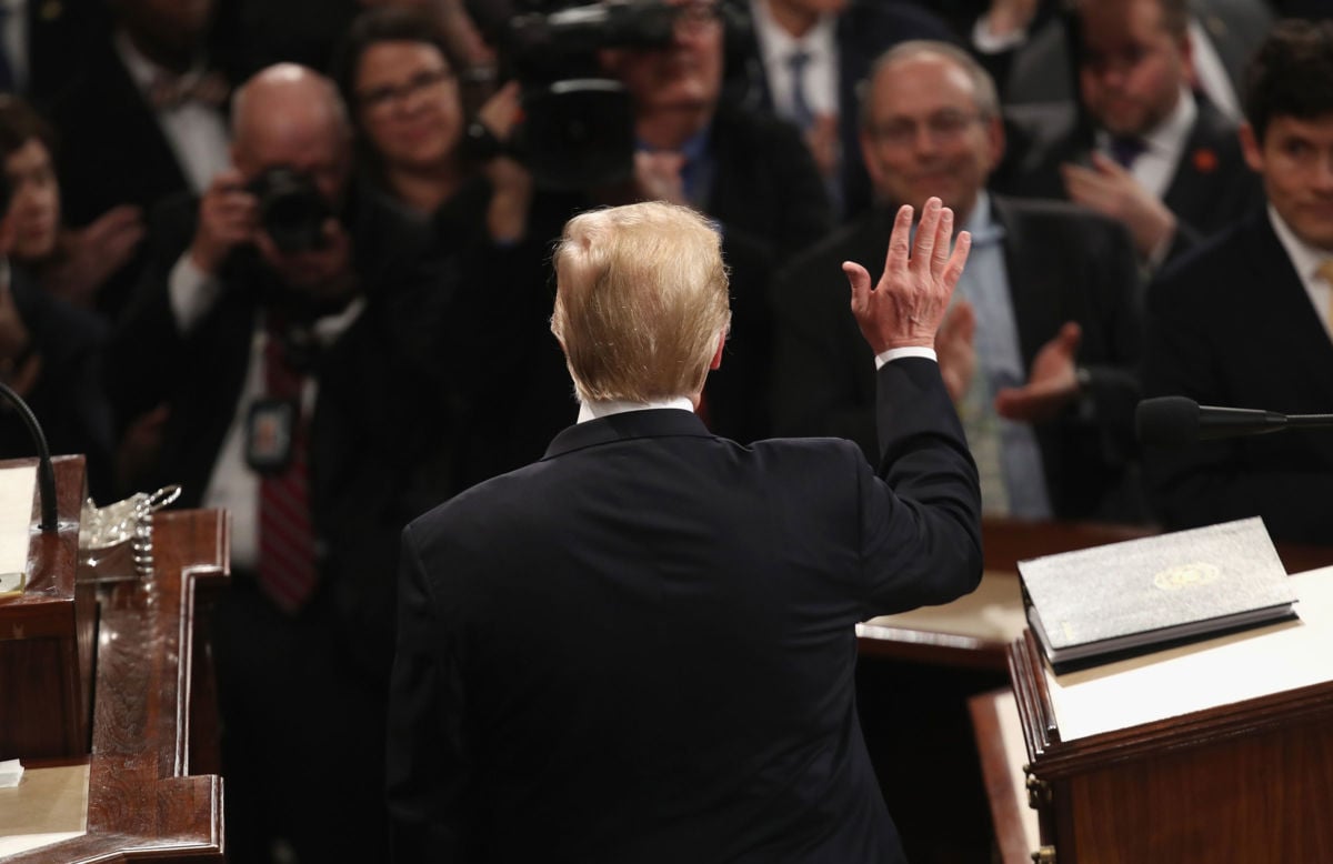 President Trump waves to the audience ahead of the State of the Union address